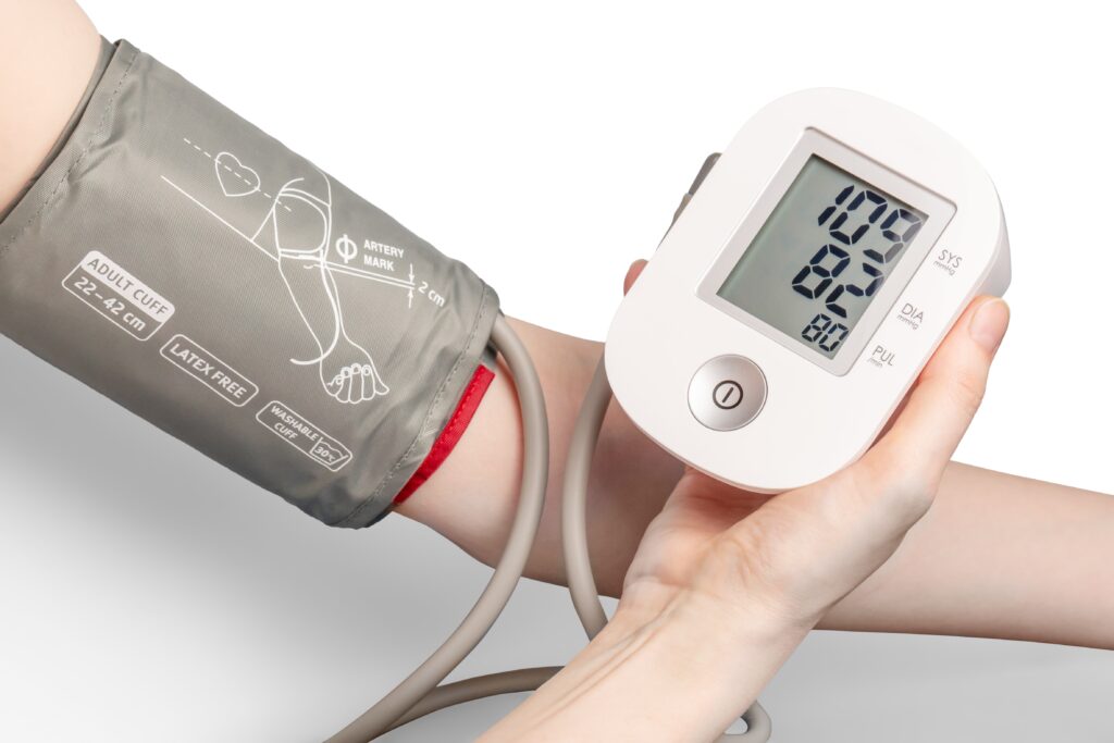 Person measuring blood pressure